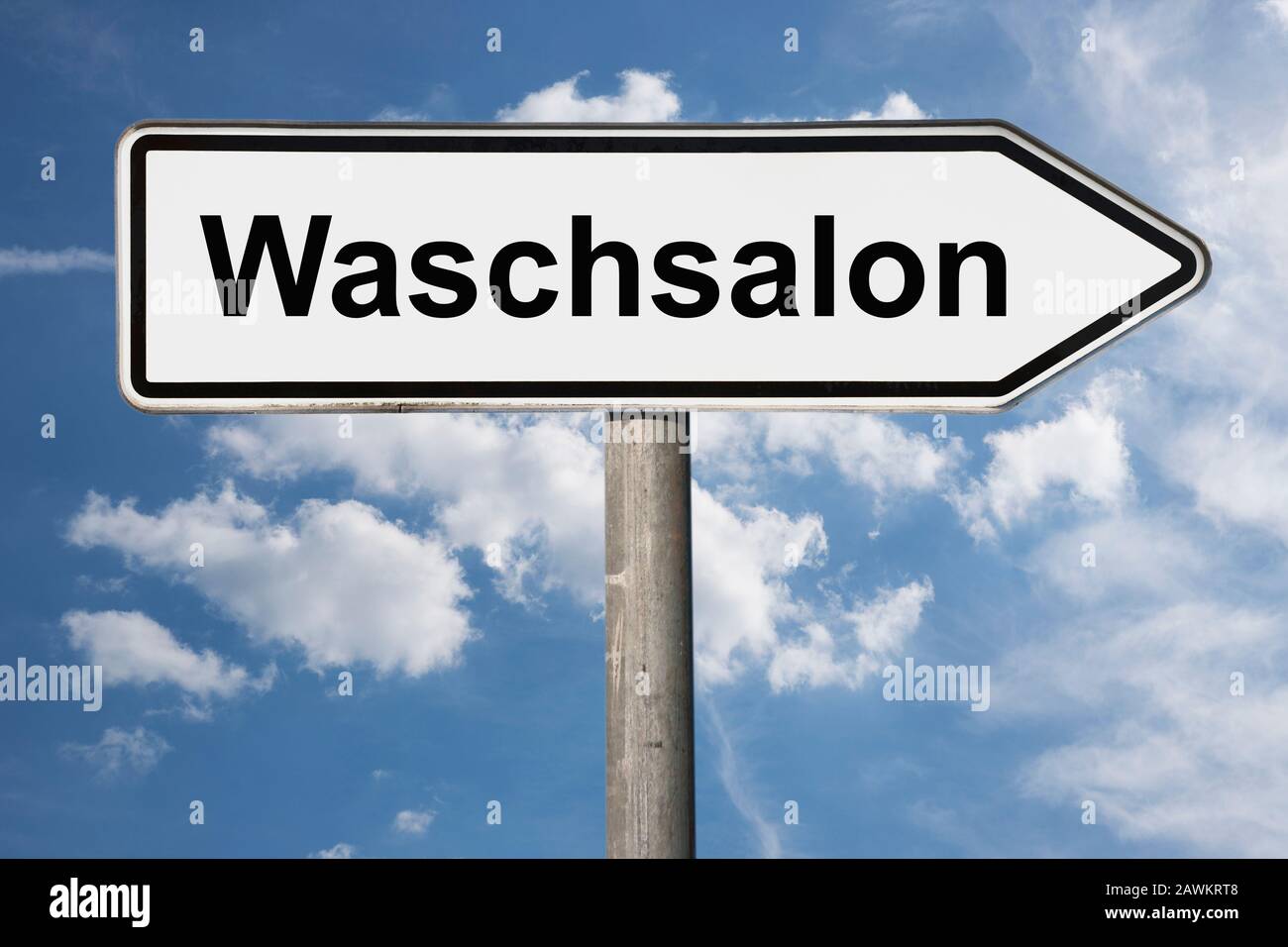 Detail photo of a signpost with the inscription Waschsalon (Laundromat) Stock Photo