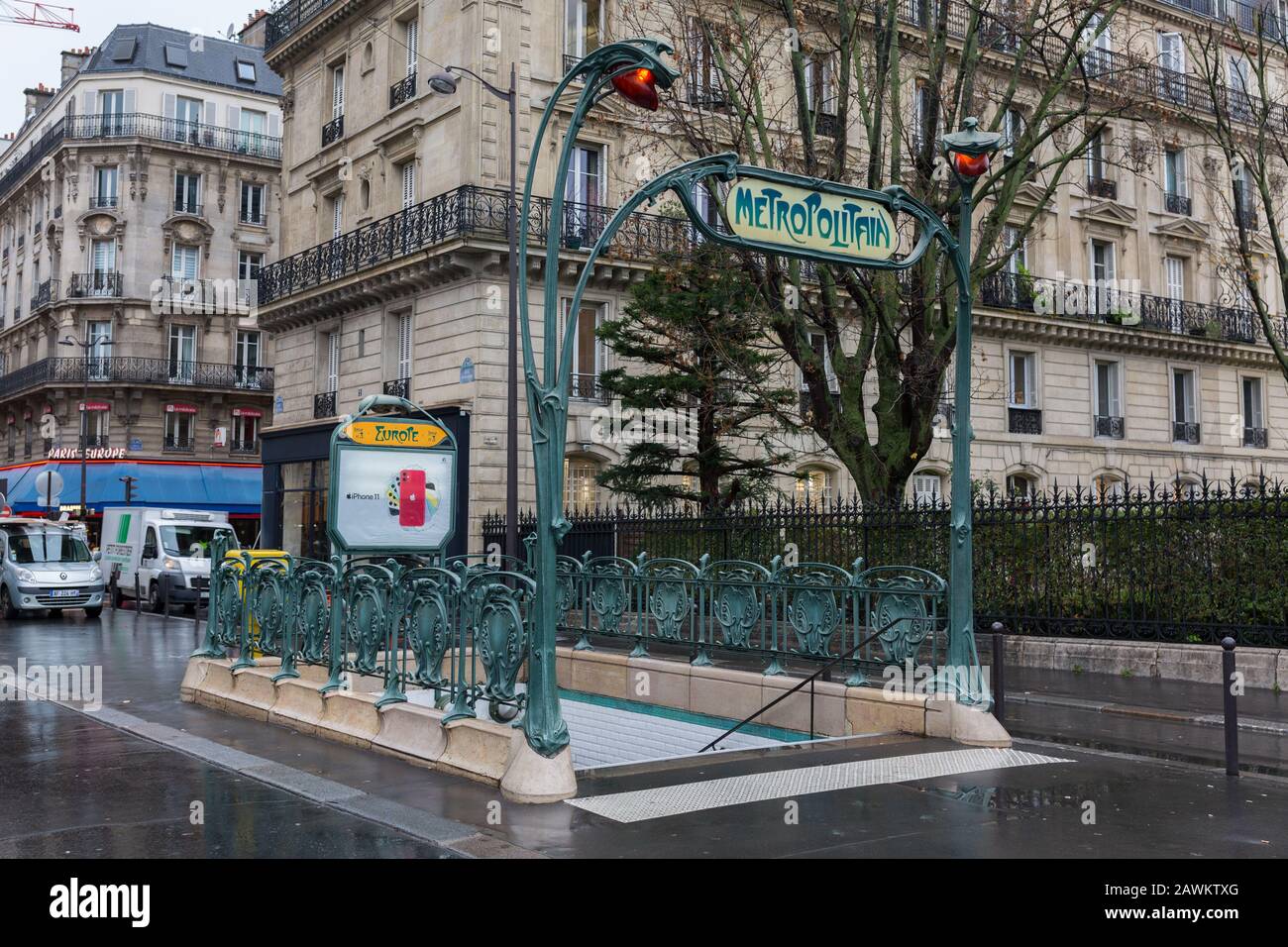 Entrance to the metropolitain - the parisian metro / subway system. The design of the railing around the gate & the sign above is called Art Nouveau. Stock Photo
