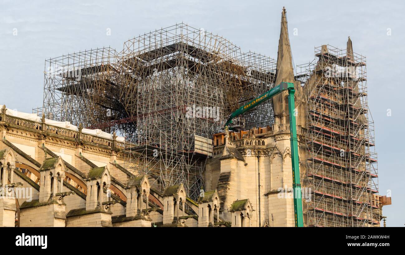 View on scaffolding on top of Notre Dame. The metal construction partally melted during the fire on April 19, 2019. Stock Photo