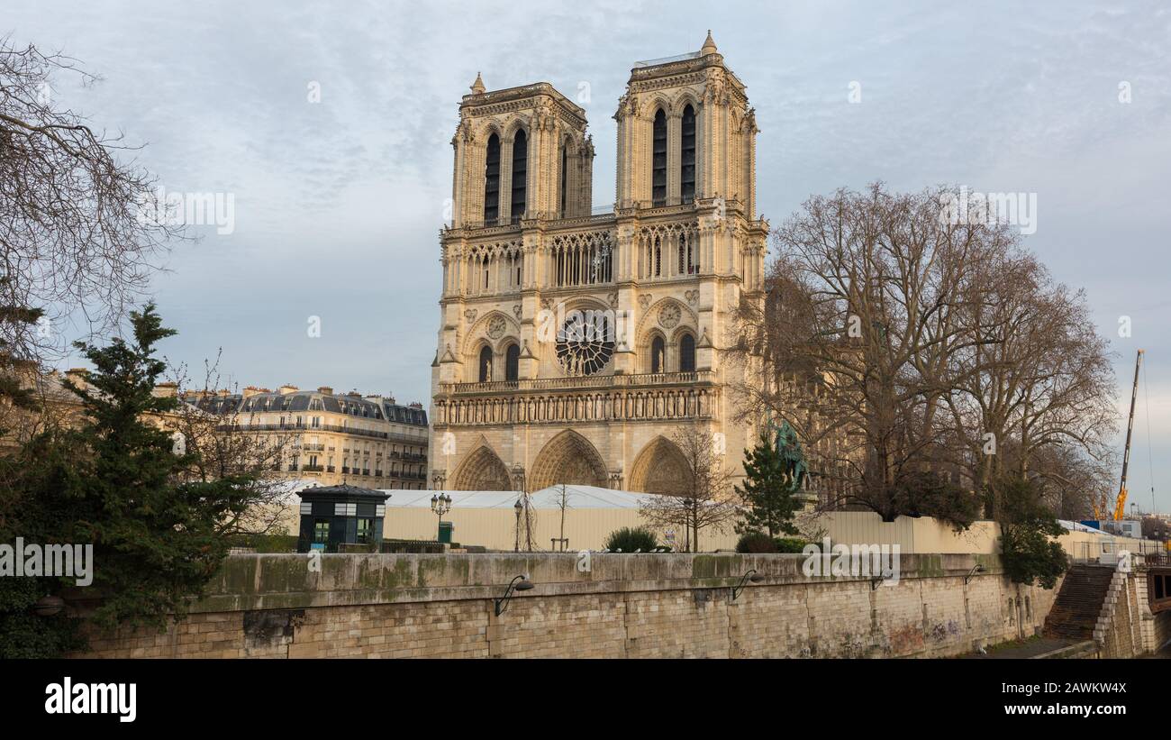 Panorama view on the two towers / steeples of Notre Dame cathedral. One of the most popular examples for gothic architecture. Top tourist destination. Stock Photo
