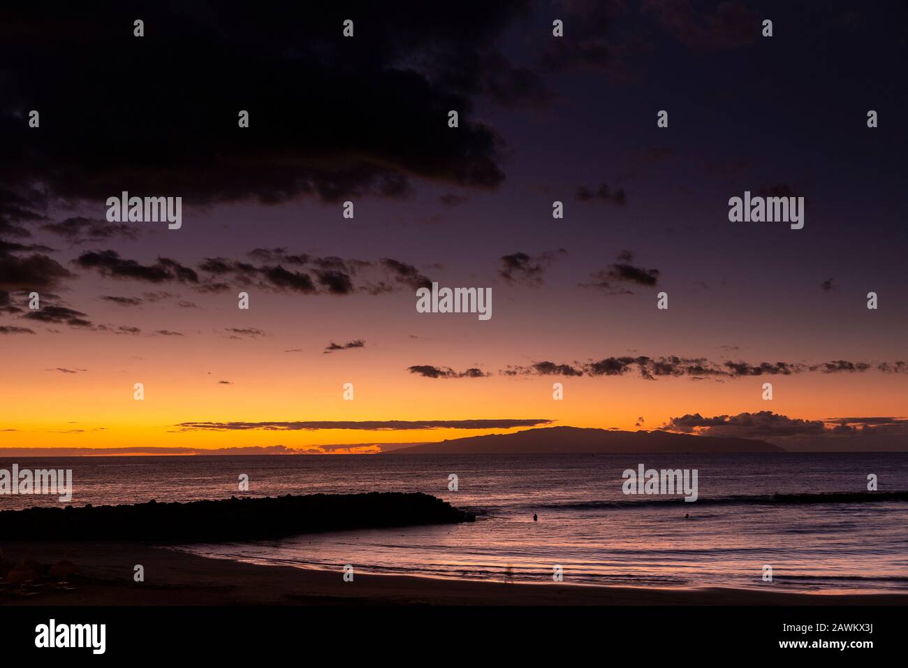 Dusk over La Gomera from Costa Adeje, Tenerife, Canary Islands Stock Photo