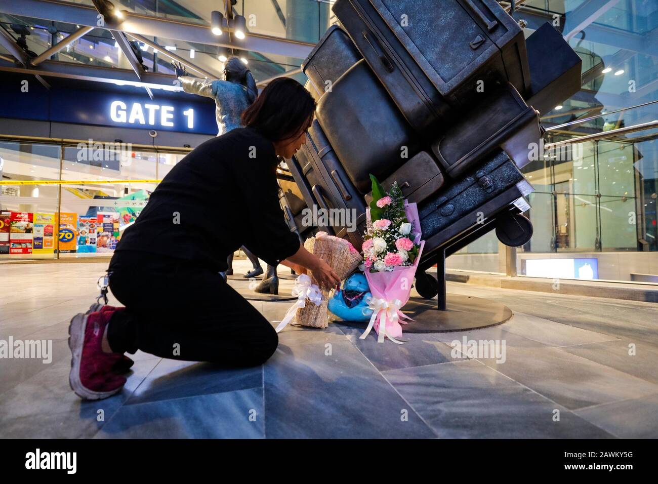 Bangkok 9th Feb A Thai Woman Places Flowers To Mourn The Victims Of The Shooting Rampage In Nakhon Ratchasima Province Thailand Feb 9 Thai Prime Minister Prayut Chan O Cha Who Visited