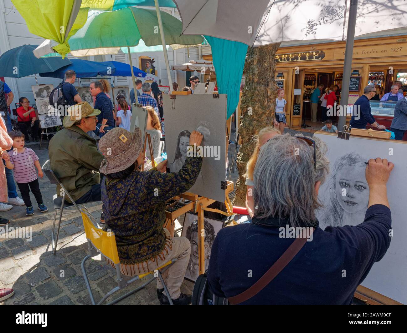 Paris, France - April 2019: Artist painters at work in Place du tertre montmartre Stock Photo