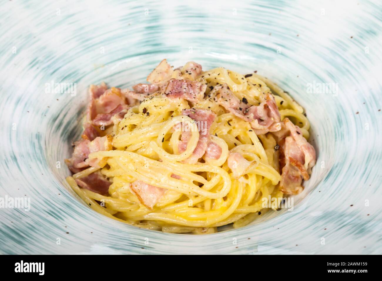 Pasta Carbonara with ham and parmesan Stock Photo Alamy