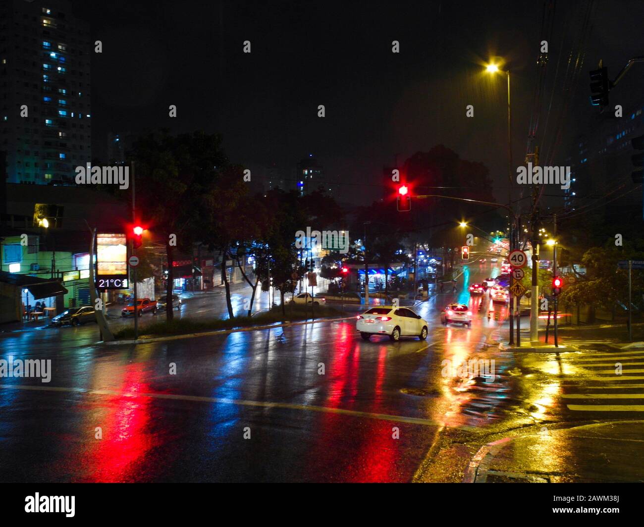 urban traffic lights during a rainy night at Sao Paulo, Brazil Stock Photo