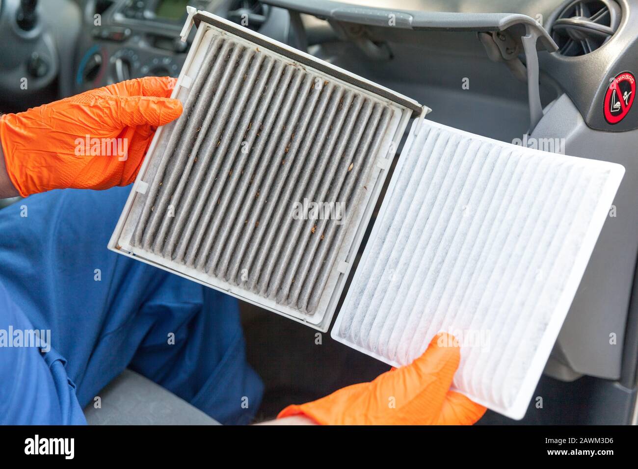 Replacing an old car cabin air filter Stock Photo Alamy