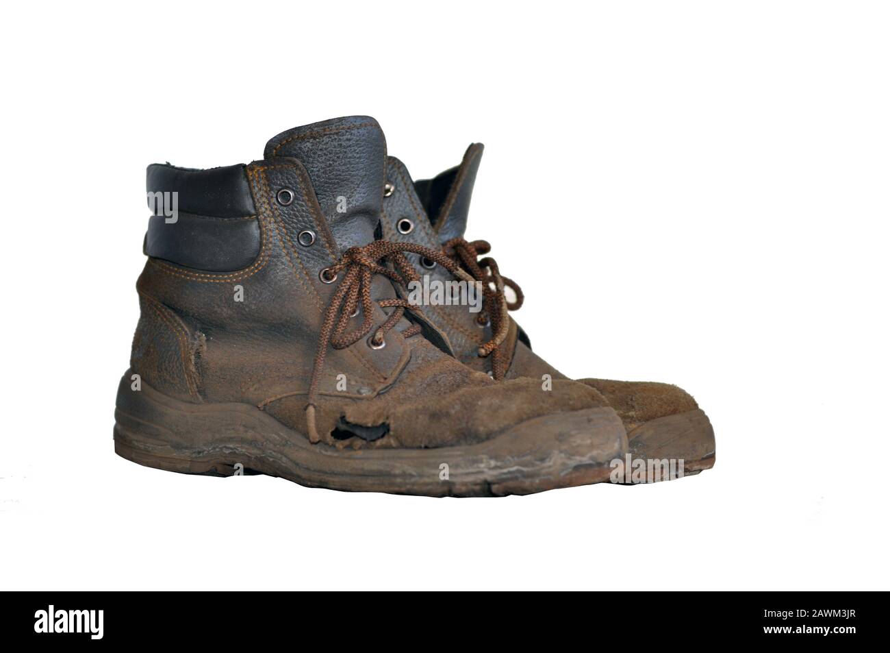 old work boots with a hole isolated on a white background. Special clothes Stock Photo