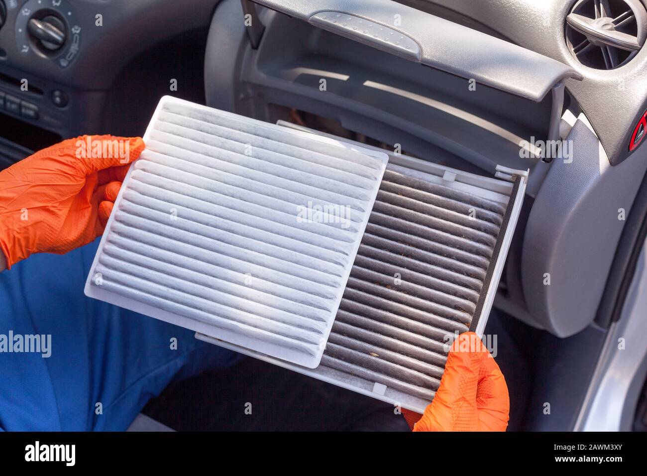 Replacing an old car cabin air filter Stock Photo Alamy