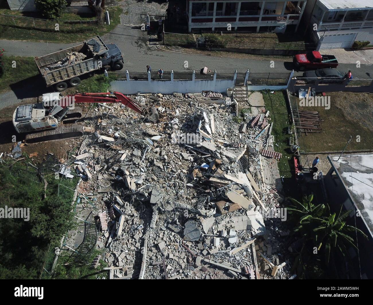 February 8, 2020, Yauco, Puerto Rico: First house demolished by an excavator due to earthquake in Almacigo Bajo Sector La Republica in Yauco, Puerto Rico. (Credit Image: © Marcus SantosZUMA Wire) Stock Photo
