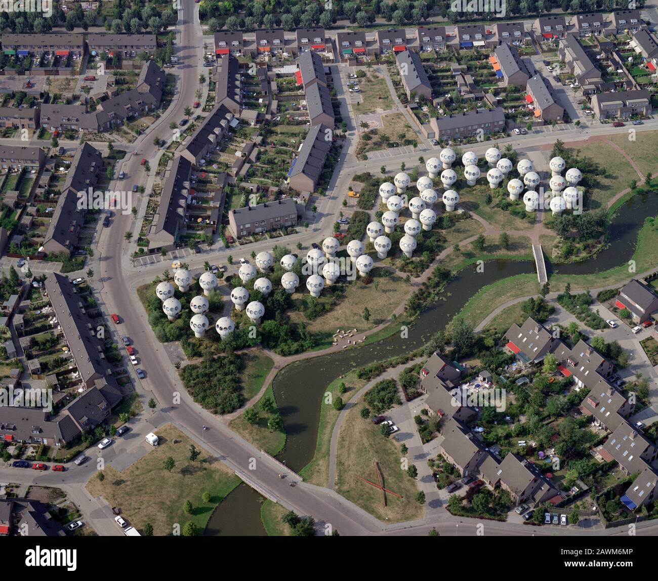 's Hertogenbosch, Holland, August 3 - 1990: Historical aerial photo of the bolwoningen, Neighborhood of Spherical Homes, in de Maaspoort Stock Photo