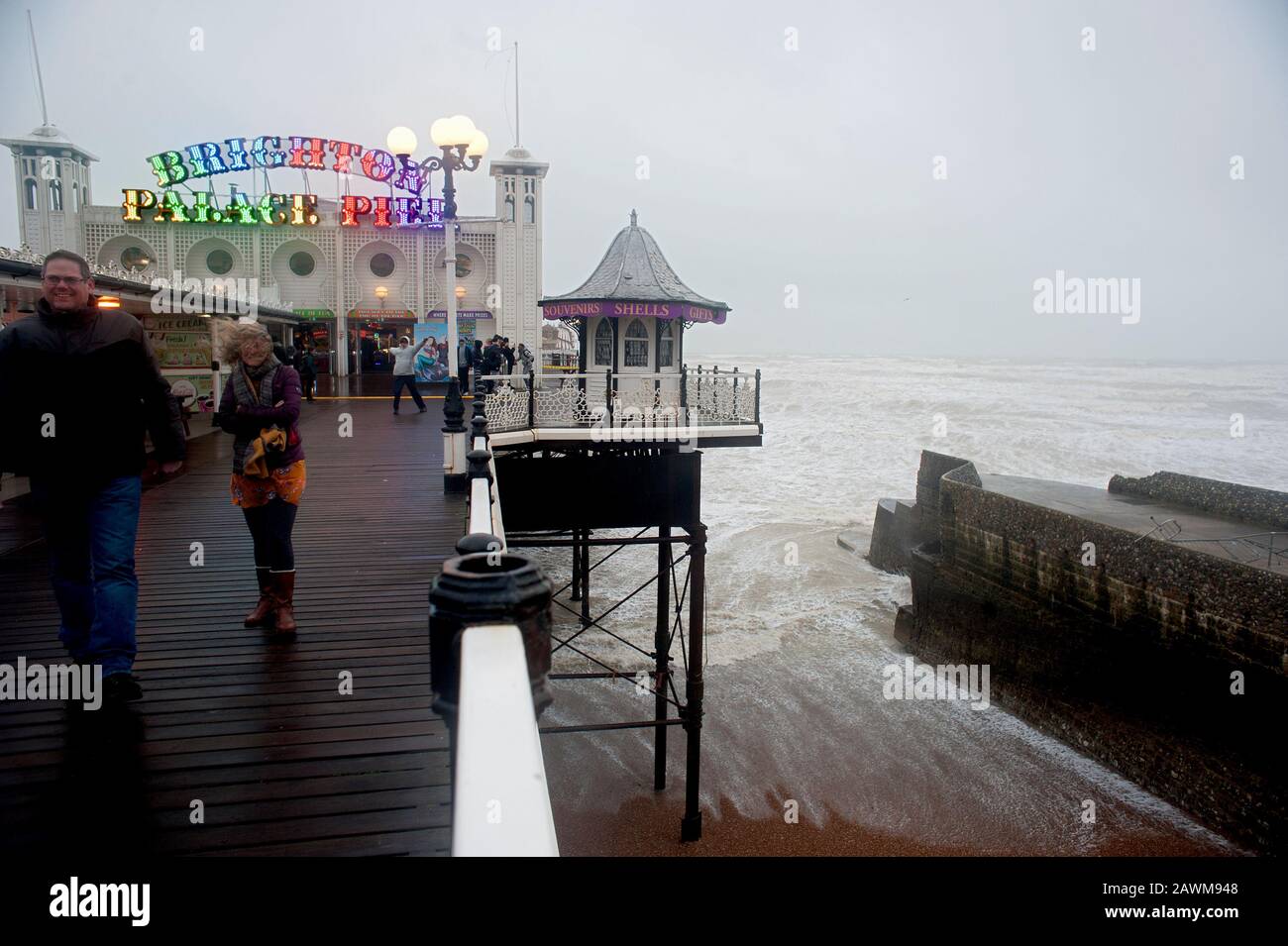 Gale force winds of up to 80 mph on Brighton Pier as Storm Ciara batters the south coast of England in 2020. Stock Photo