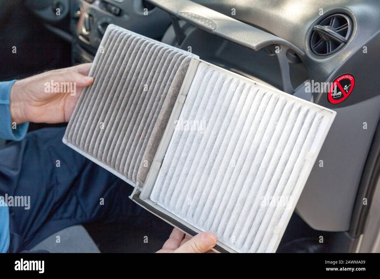 Replacing an old car cabin air filter Stock Photo Alamy