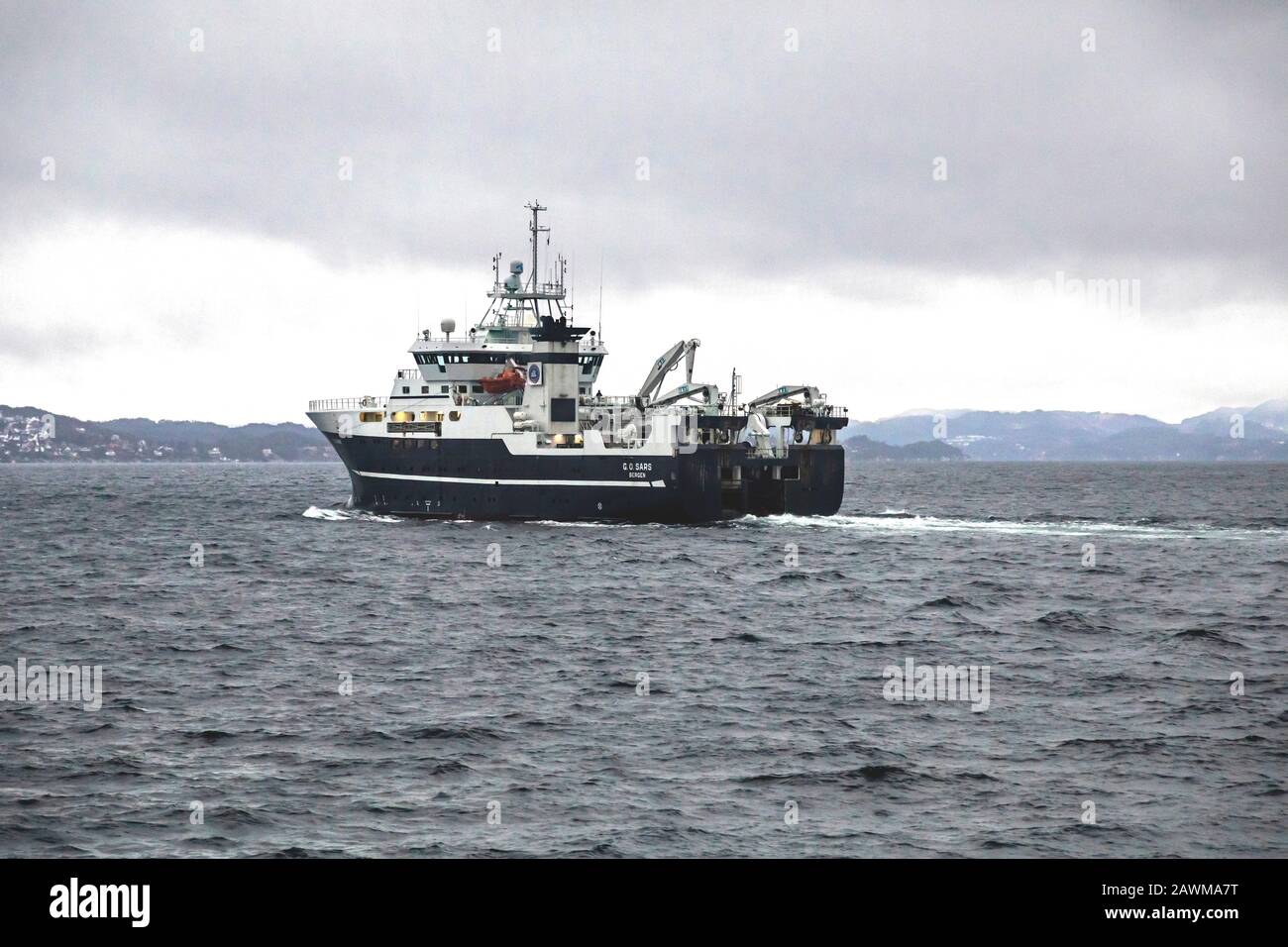 Marine research and survey vessel G.O.Sars departing from the port of Bergen, Norway. Stock Photo