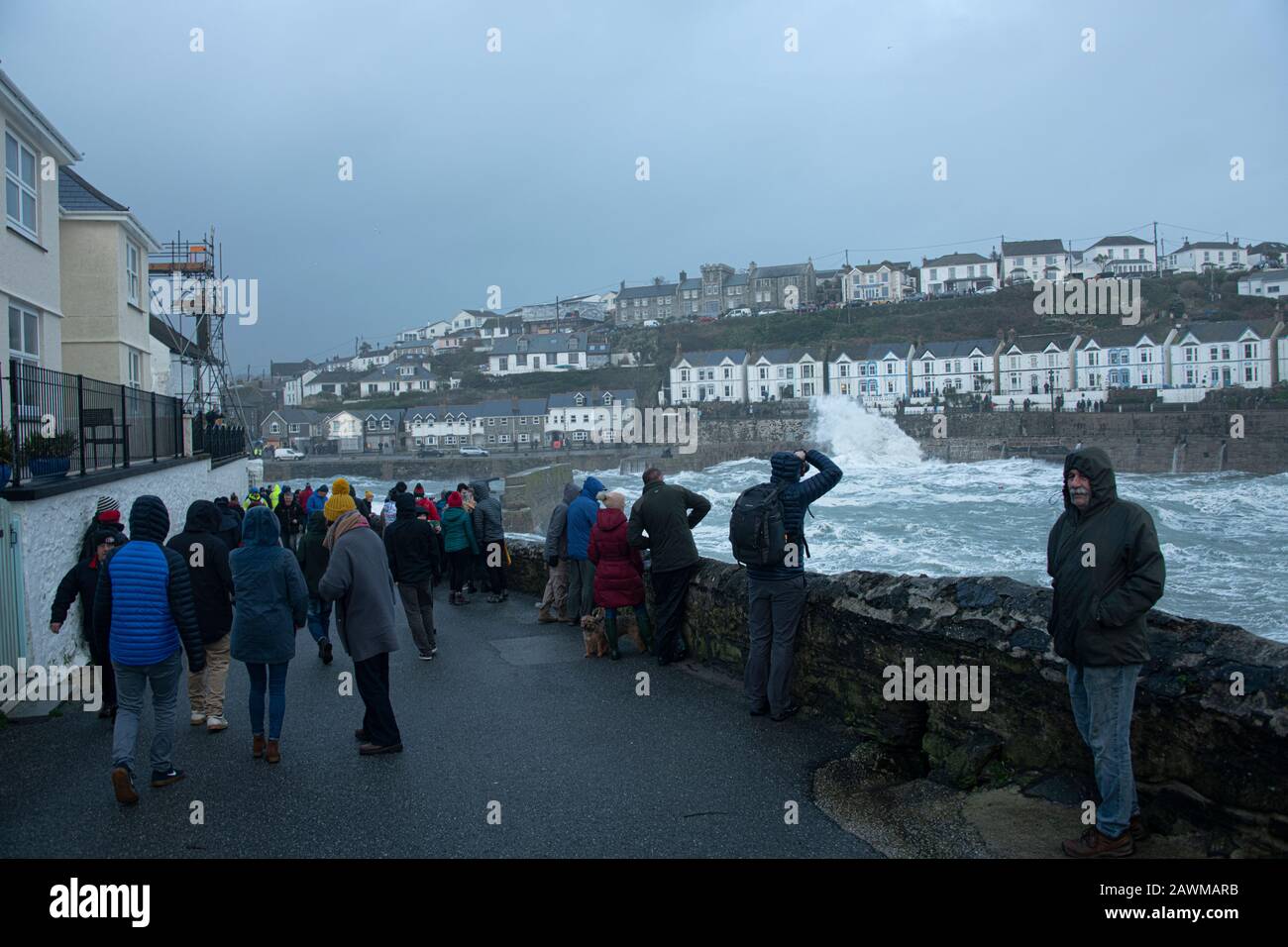 Porthleven, Cornwall, UK. 09th Feb, 2020. Crowds watch as Storm Ciara