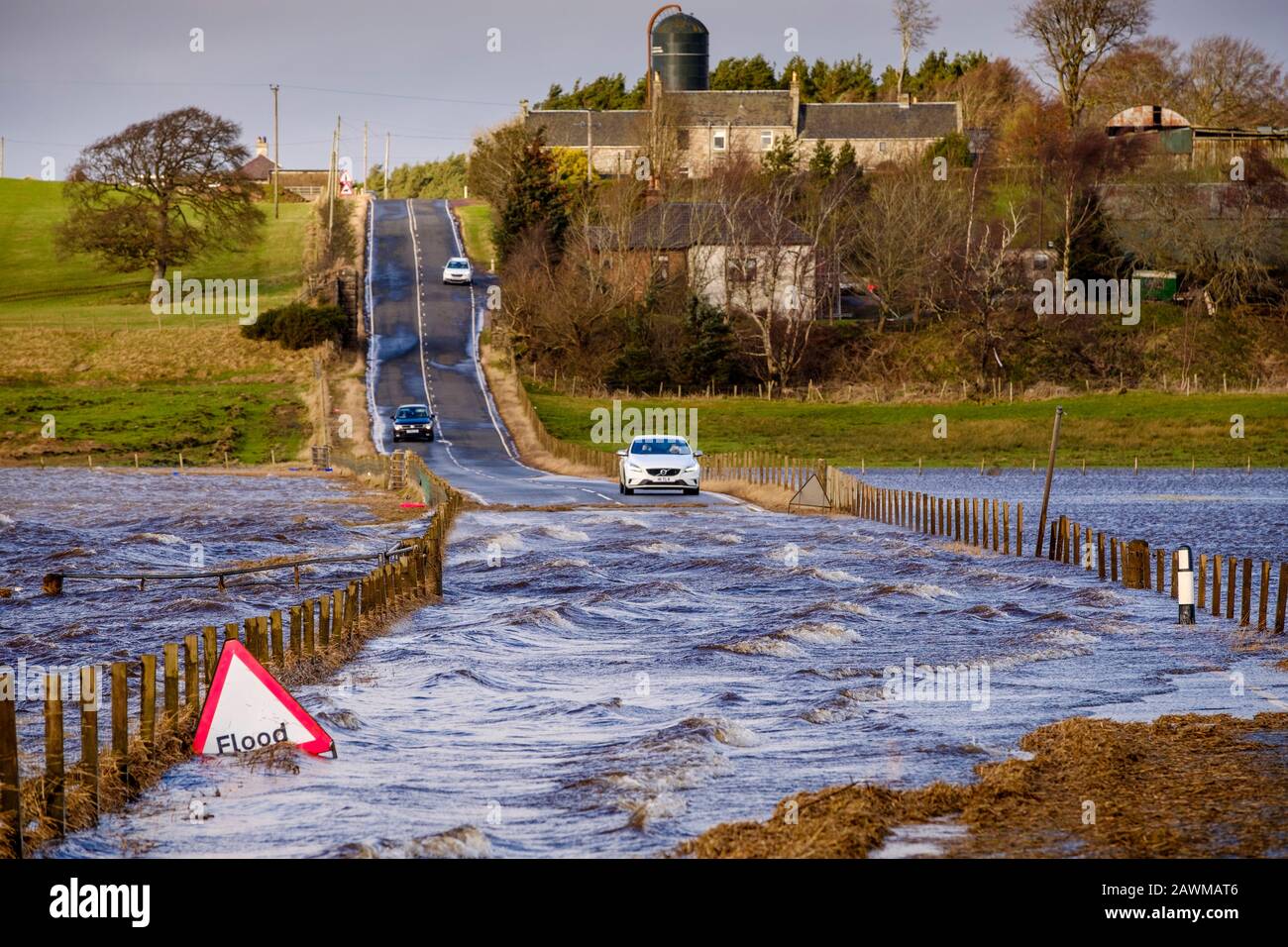 Storm Ciara causes the River Medwin (a tributary of the River Clyde) to burst its banks in South Lanarkshire, Scotland causing wide spread flooding . Stock Photo