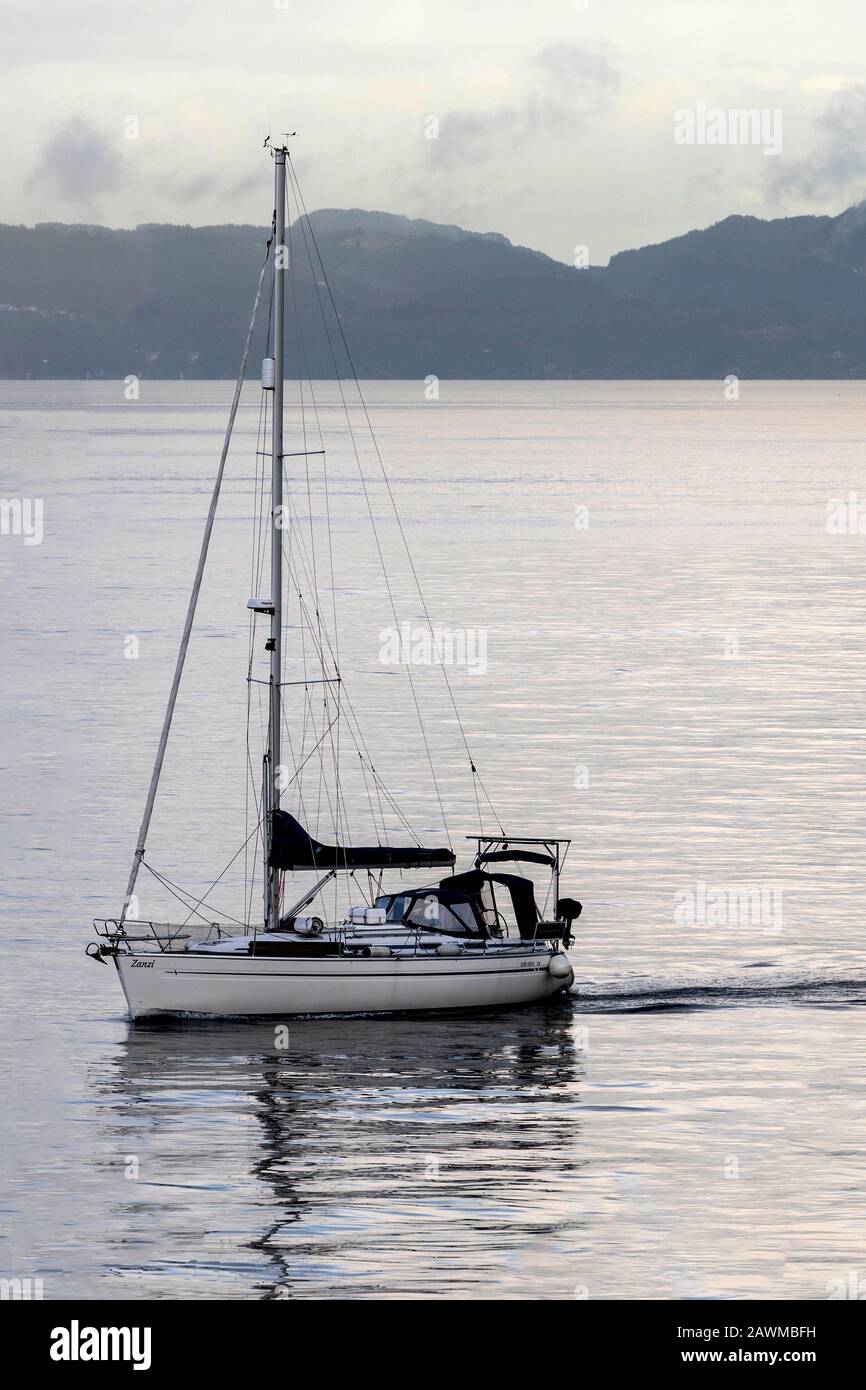 Bavaria type sailboat Zanzi at Byfjorden, outside Port of Bergen, Norway Stock Photo