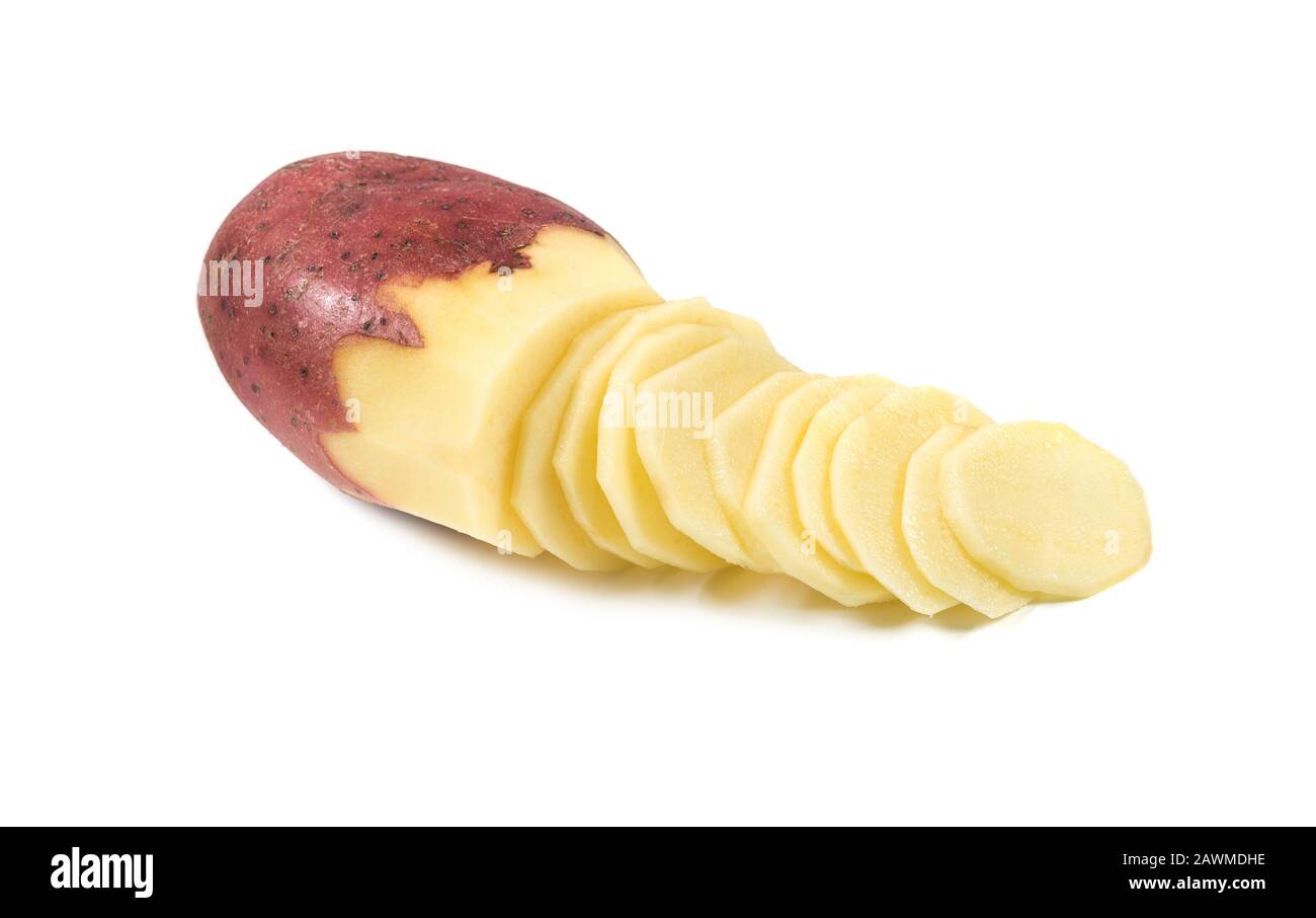 Cut raw potato vegetable isolated on white background. How made homemade potatoes chips Stock Photo