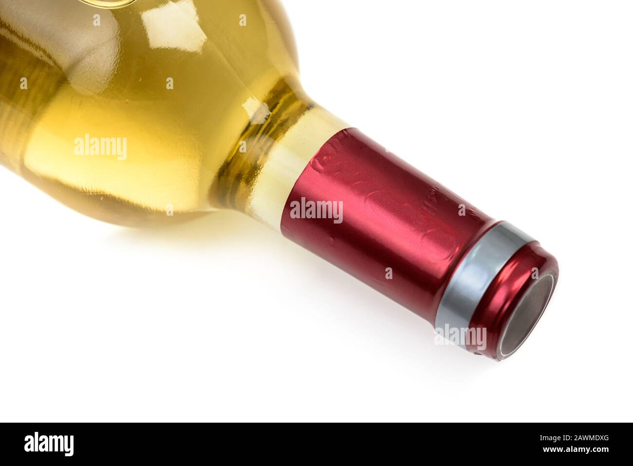 Lying white wine bottle close up. Bottleneck isolated on white background Stock Photo