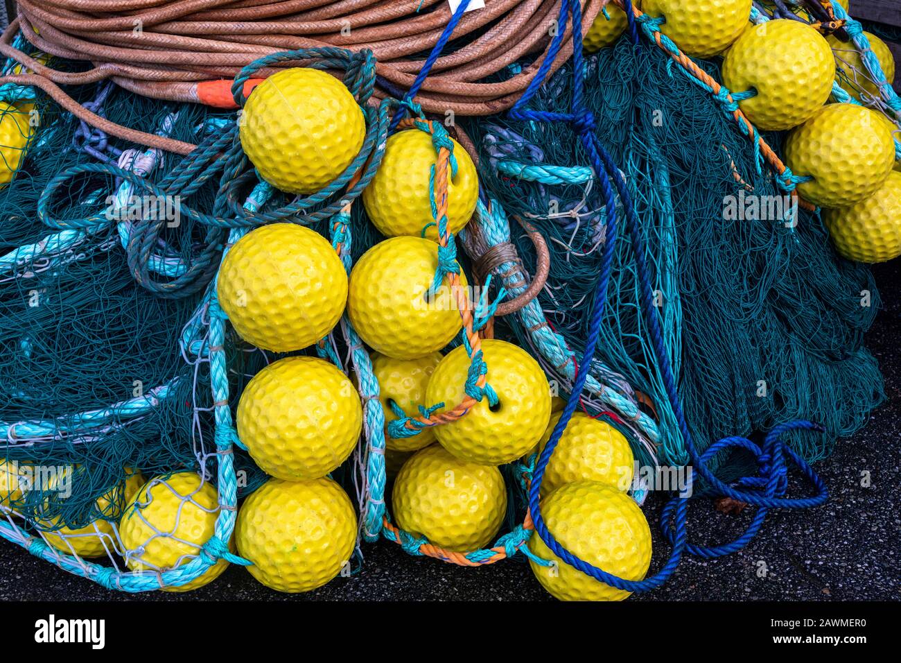 Fish nets and floaters in the port of Bergen, Norway Stock Photo
