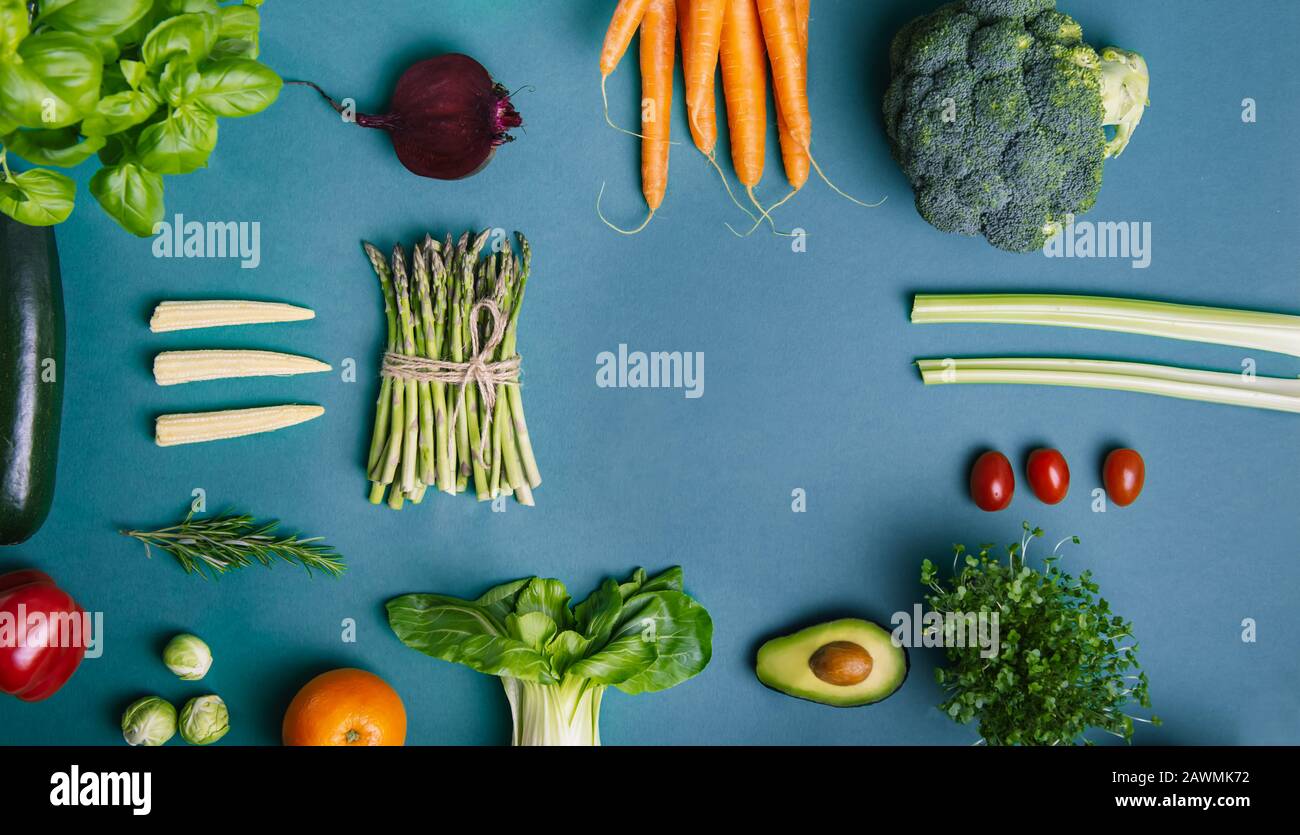 Top view set of healthy raw vegetables and fruits with copy space on ...