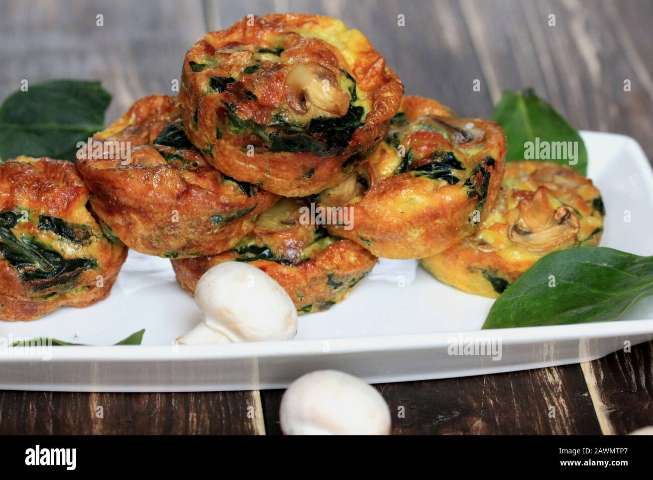 Breakfast muffins with mushrooms. Mushroom muffins. Tasty breakfast. Perfect dry breakfast. Stock Photo