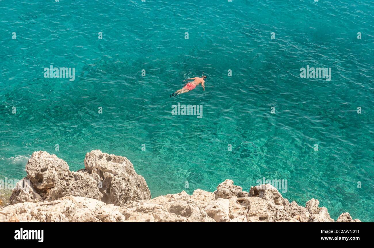 Swimming and snorkling on  Gjipe beach in Himare- region of Vlore, Albania Stock Photo