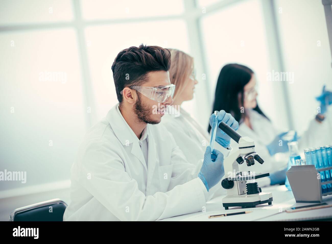 group of laboratory technicians checking tests for coronavirus Stock Photo