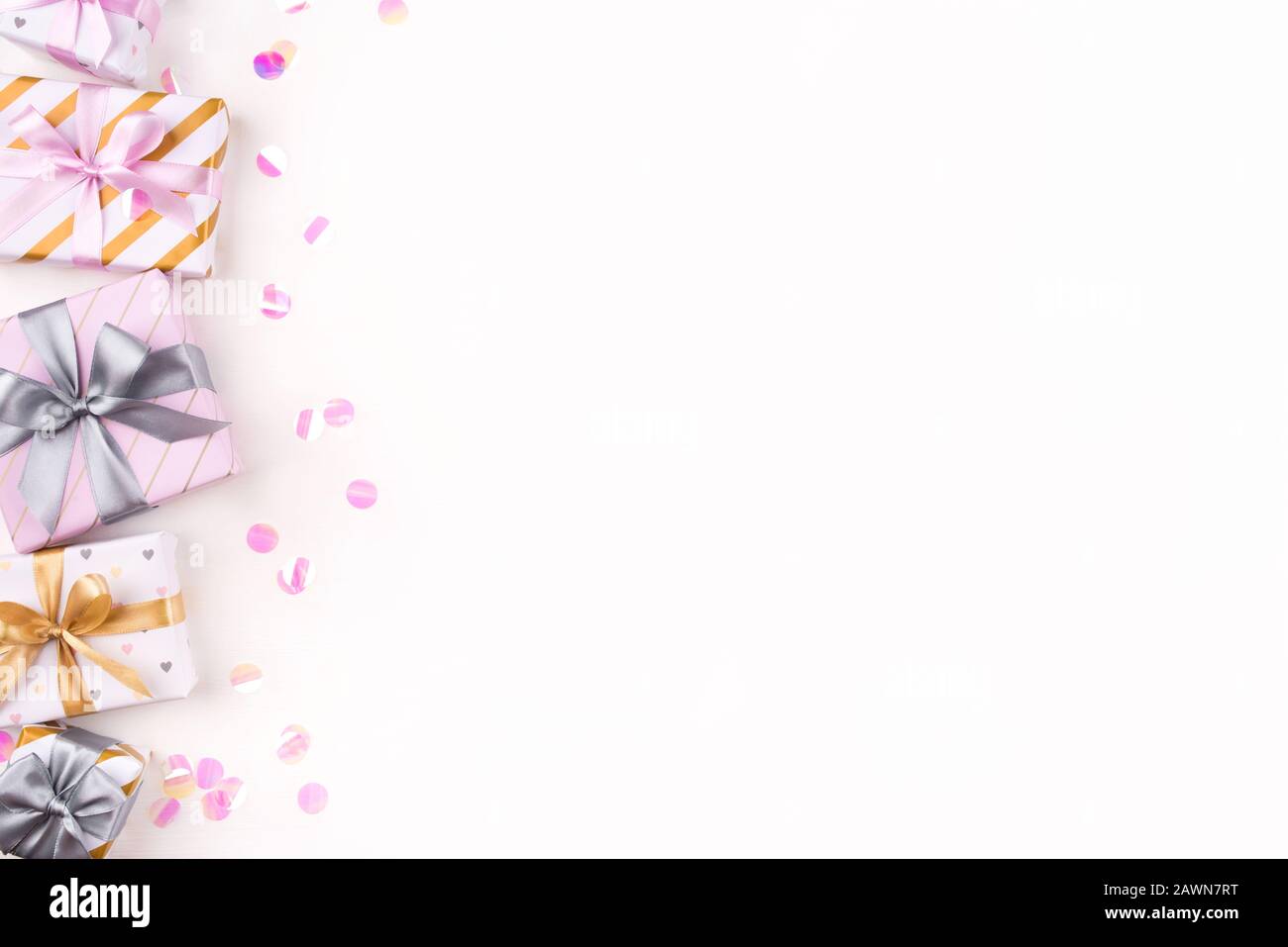 Set of gift boxes with bows and confetti on a white background Stock ...