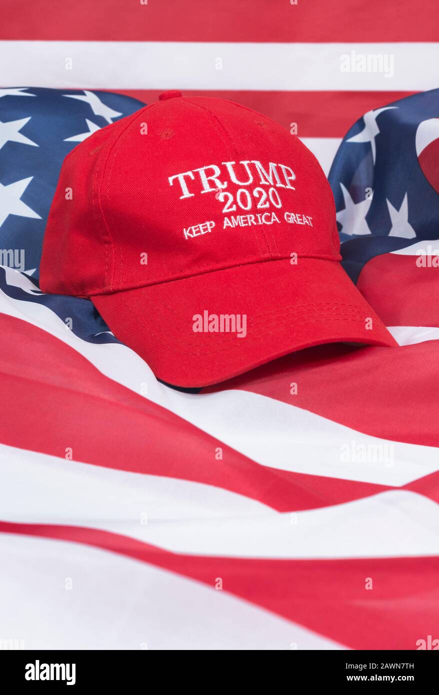 Trump 2020 campaign hat / KAG cap + Stars & Stripes. Trump supporters, 2020 election campaign, 2020 US election, Keep America Great, Trump Red Wave. Stock Photo