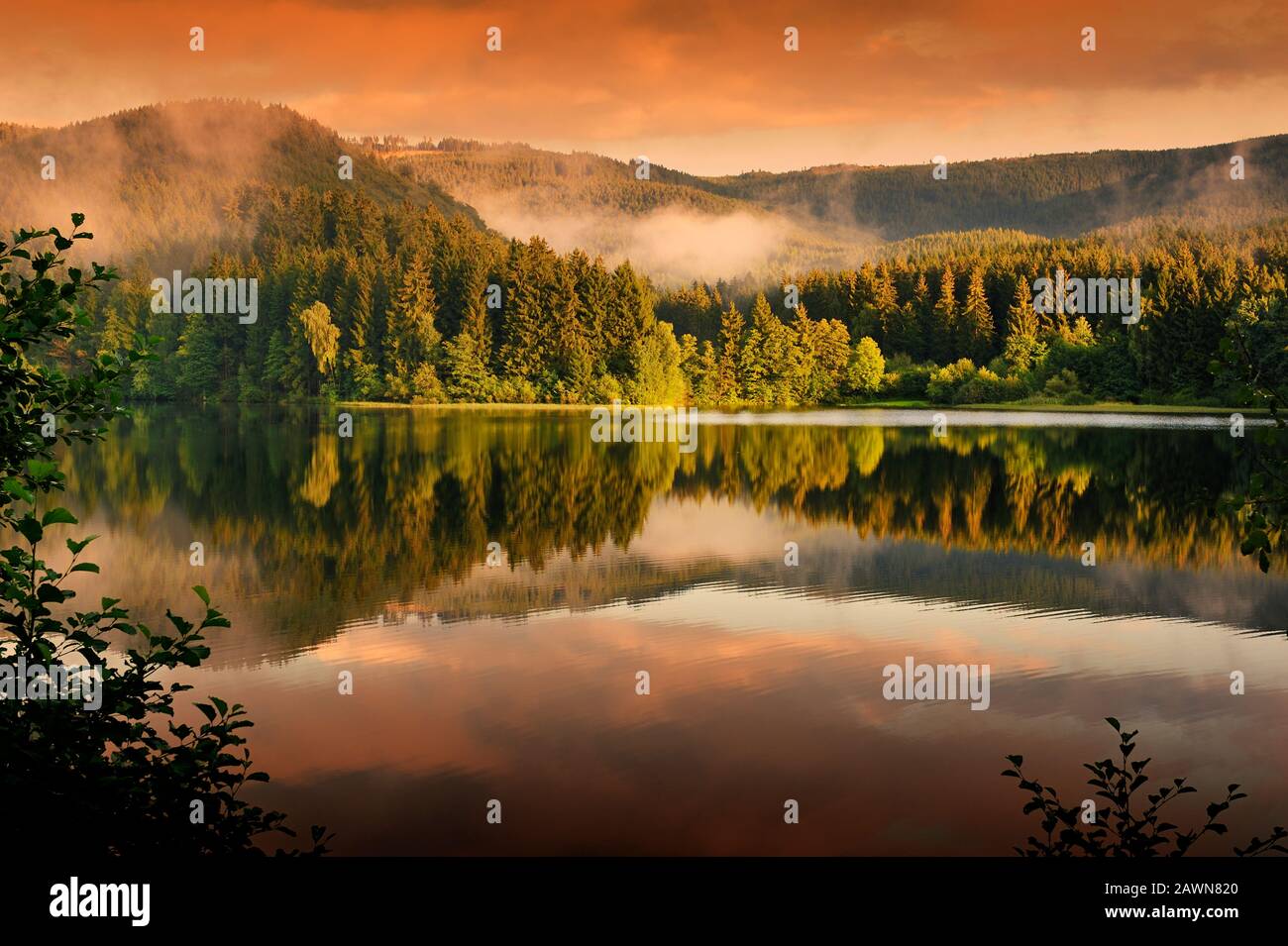 Lake surrounded by mountains,Harz,Germany. Stock Photo