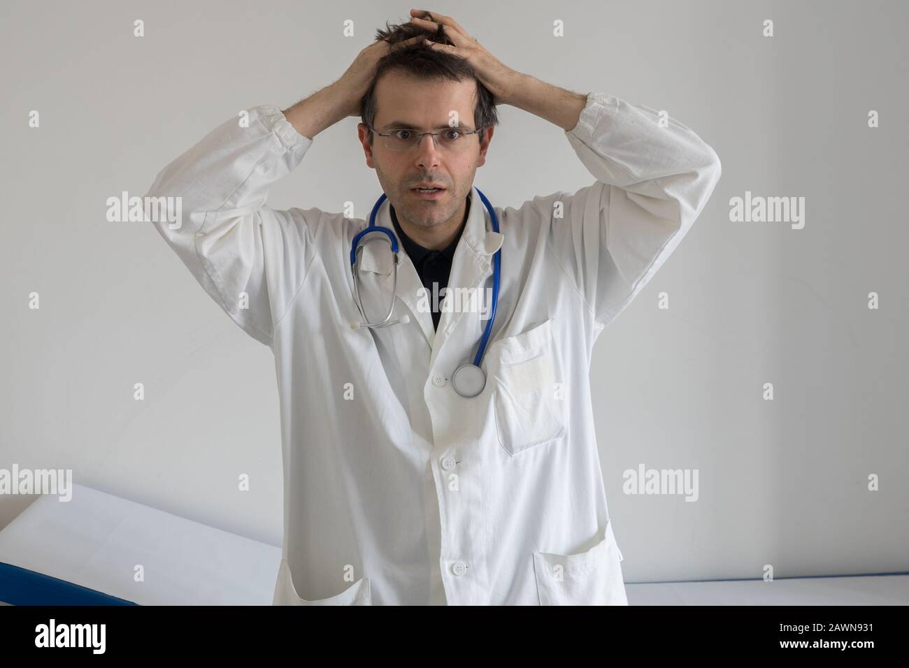 Doctor and distraught patient hi-res stock photography and images - Alamy