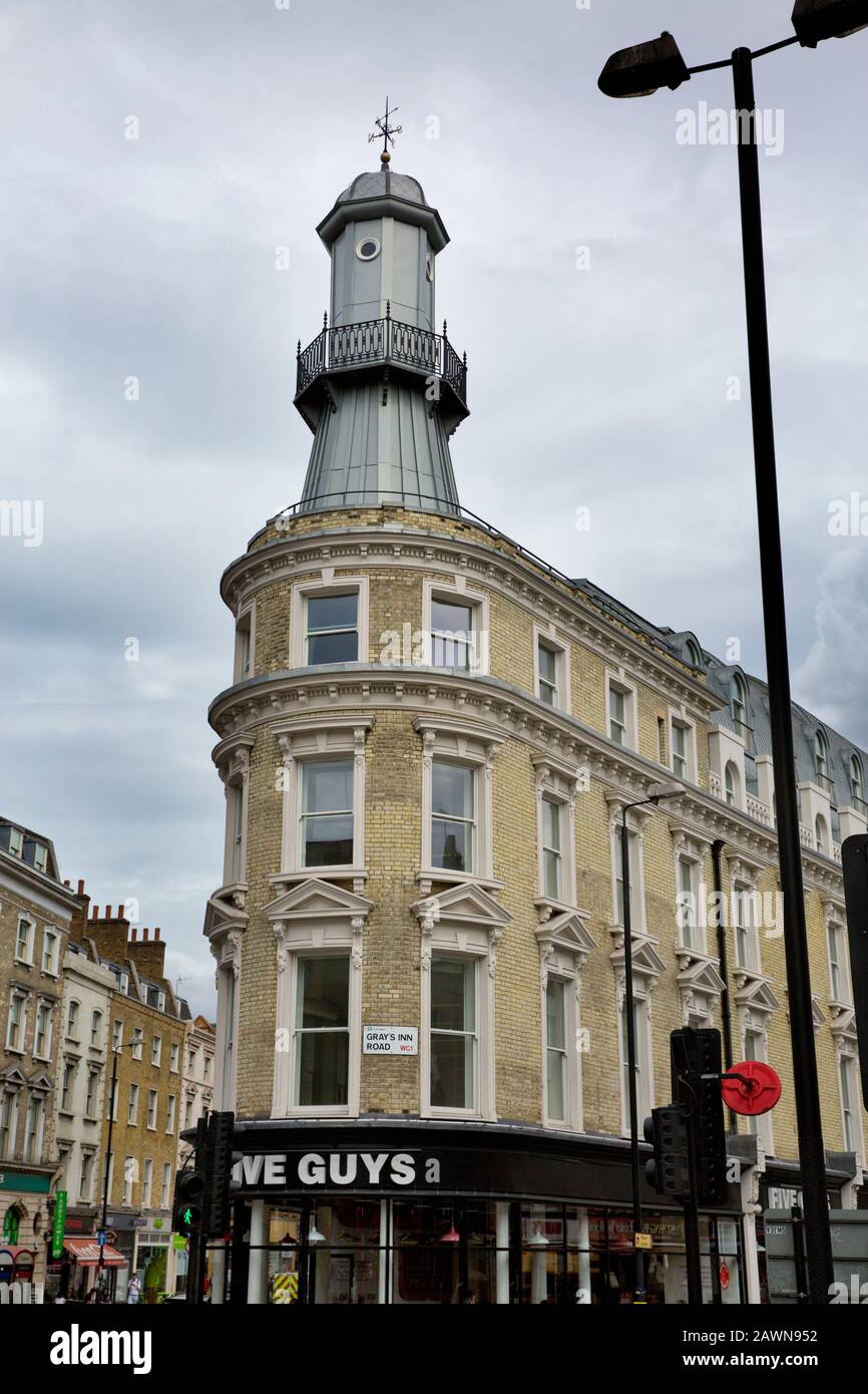 The Lighthouse building sits on the junction of Gray’s Inn Road, Pentonville Road, York Way and Euston Road. Kings Cross, London, United Kingdom Stock Photo