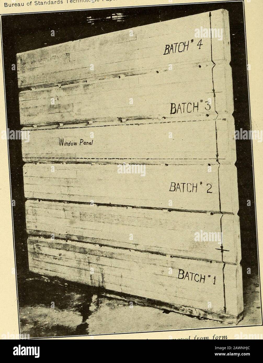 Pouring and pressure tests of concrete. . Fig. i.—Assembled reinforcement and form for specimen used in pouring test Bureau of Standards Technolog nologic Paper No. 175. FlG. 2.—Pouring -test specimen removed from fc Pouring and Pressure Tests of Concrete 5 rose to the surface of the concrete. The rising of air bubblescontinued for a considerable length of time, and had not entirelystopped when pouring was completed and the pounding wasdiscontinued. During the pouring of the slab an observation was made tofind the angle of repose of the concrete. The concrete wTas pouredinto the form at one po Stock Photo