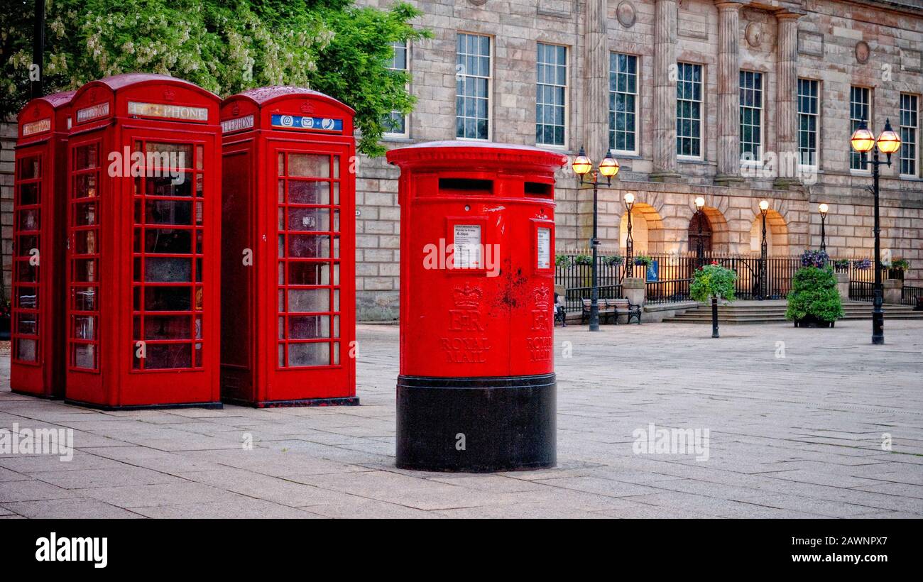 Red Telephone Boxes and Royal Mail Boxes in Stafford, England Stock Photo