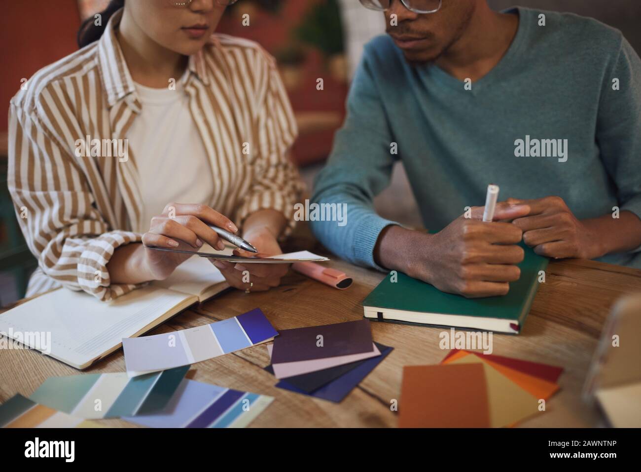 Smiling creative business team working hi-res stock photography and ...