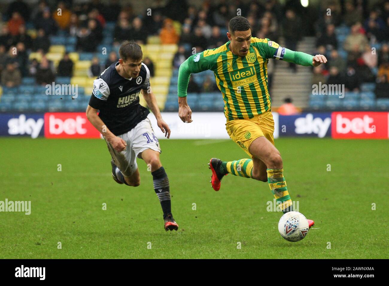 London, UK. 09th Feb, 2020. Jake Livermore of West Bromwich Albion takes on Jayson Molumby of Millwall during the EFL Sky Bet Championship match between Millwall and West Bromwich Albion at The Den, London, England on 9 February 2020. Photo by Ken Sparks. Editorial use only, license required for commercial use. No use in betting, games or a single club/league/player publications. Credit: UK Sports Pics Ltd/Alamy Live News Stock Photo