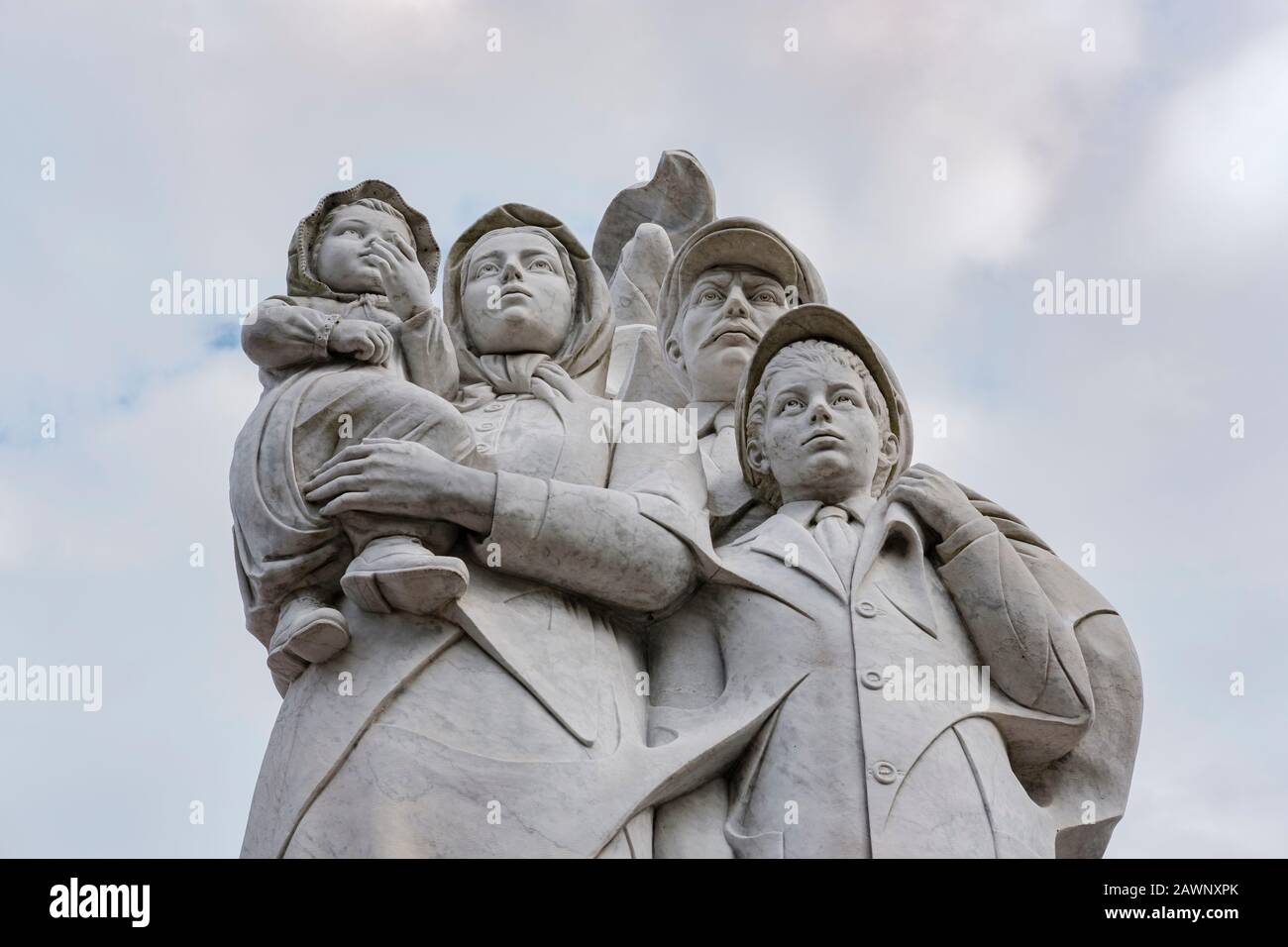 Monument to the Immigrant marble statue by Italian sculptor Franco Alessandrini, Waldenberg Riverfront Park, River Walk, New Orleans, Louisiana, USA Stock Photo