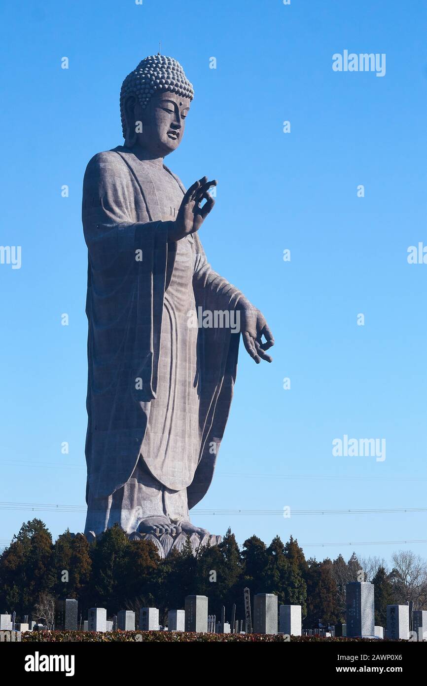 The bronze Ushiku Daibutsu (Great Buddha) with hands in