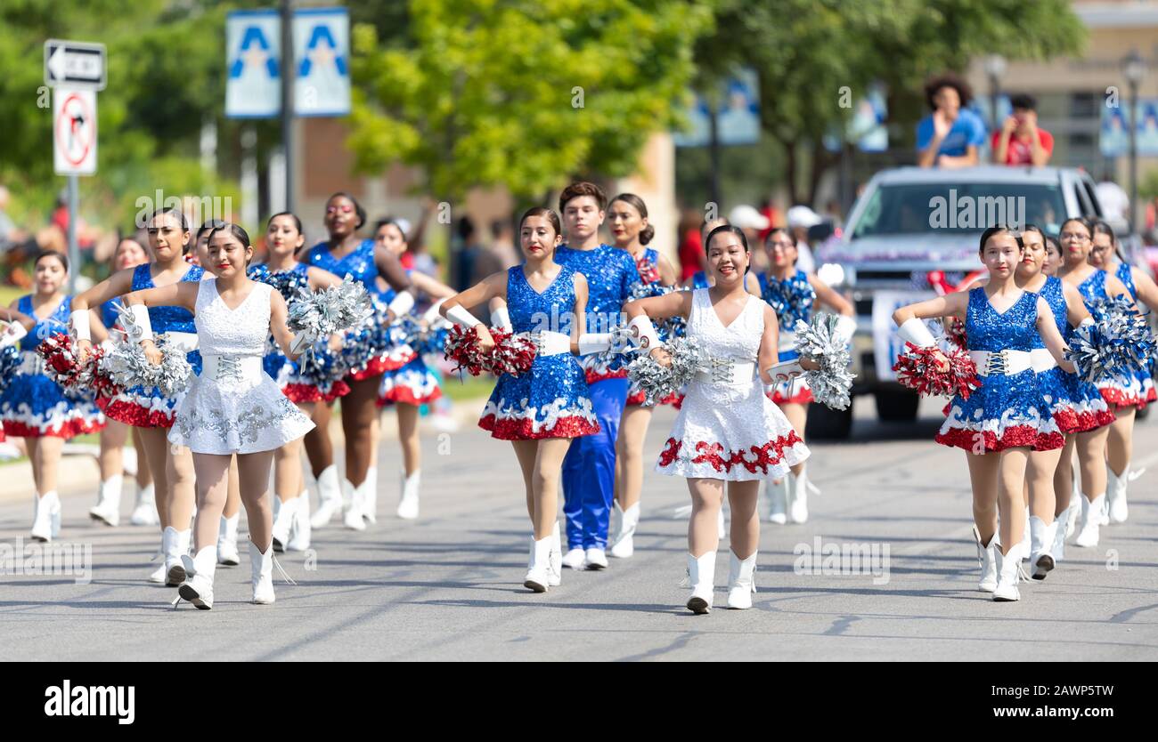 Arlington, Texas, USA - July 4, 2019: Arlington 4th of July Parade, Members of the Sam Houston High School, cheerleaders, performing at the parade Stock Photo