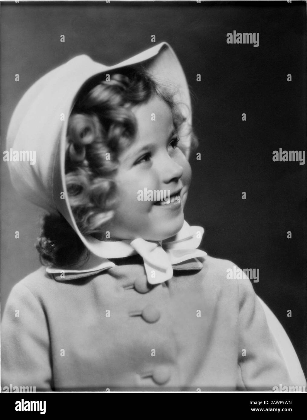 1936 ca , USA : The child actress SHIRLEY TEMPLE ( 1928 - 2014 ) ,  pubblicity still  - MOVIE - FILM - CINEMA - portrait - ritratto - boccoli - riccio Stock Photo