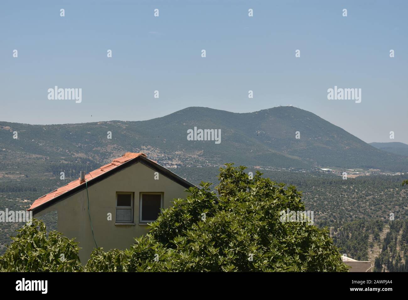 Landscape of mountains and a building in the mystical city of Tzfat Stock Photo