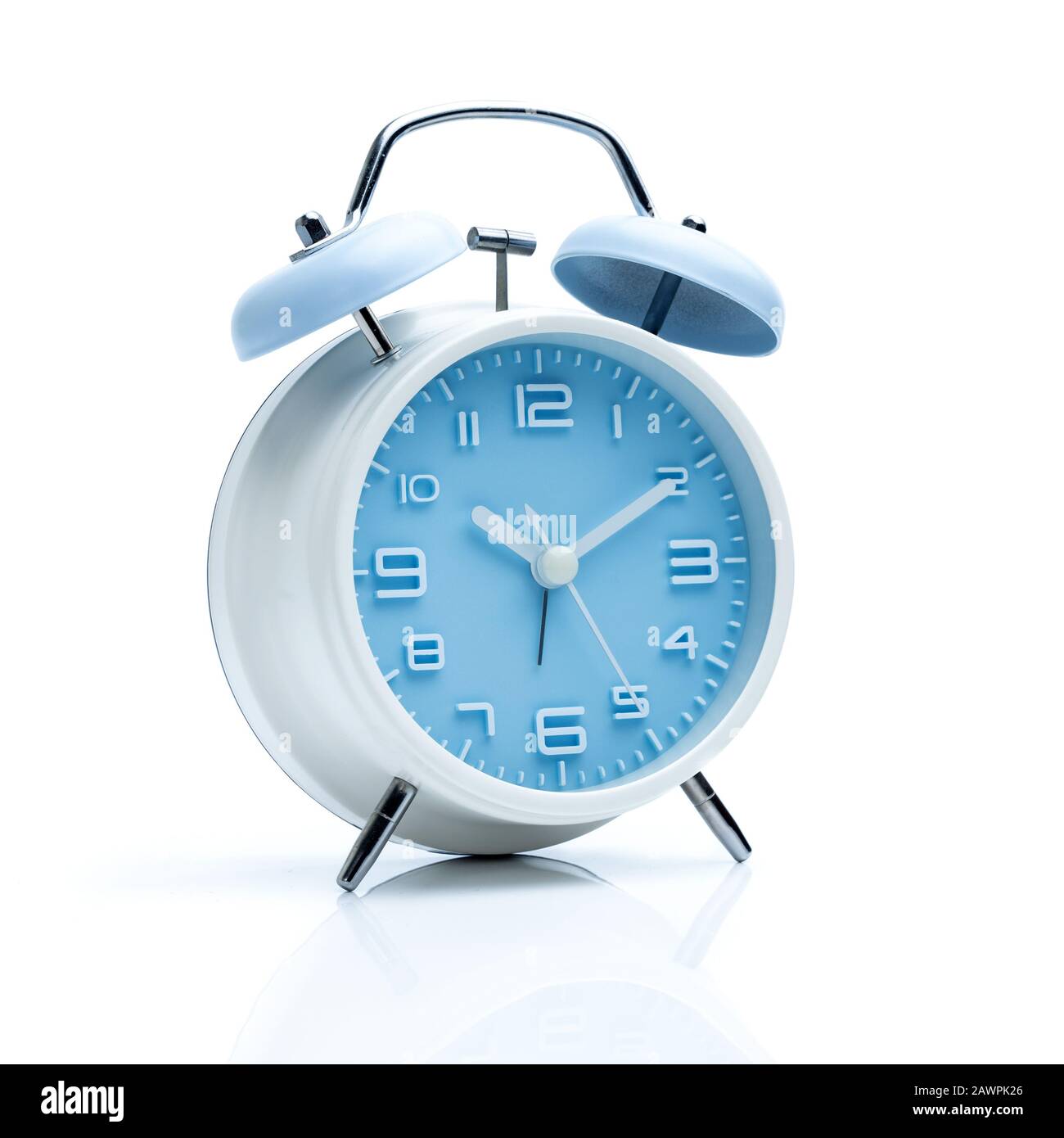 Old fashioned alarm clock on white background Stock Photo - Alamy