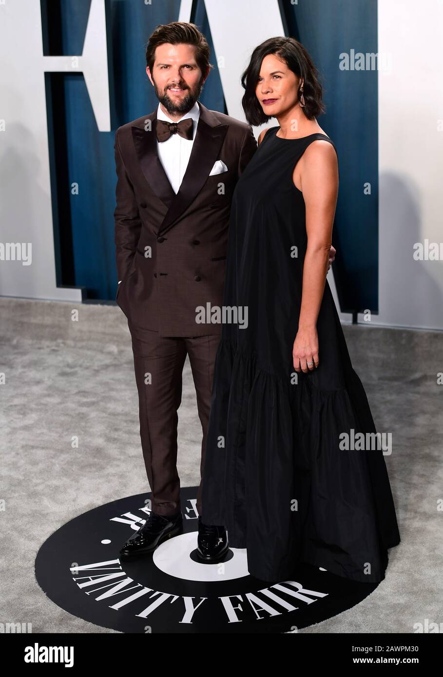 Adam Scott and Naomi Scott attending the Vanity Fair Oscar Party held