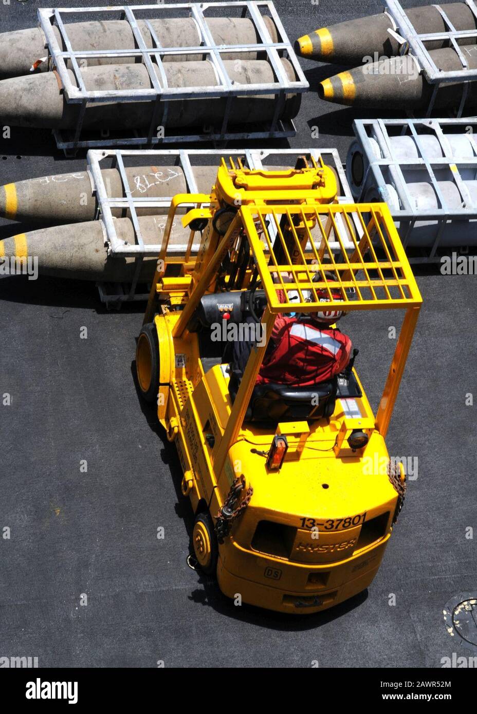 Forklift is moving bombs Stock Photo Alamy