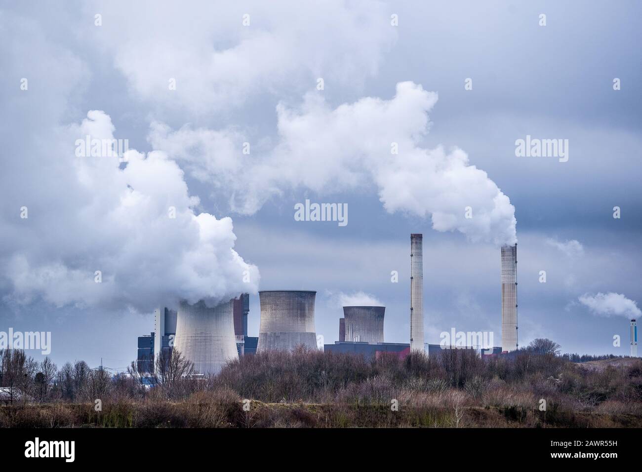 Wide angle shot of white smoke coming out of the nuclear plants Stock Photo