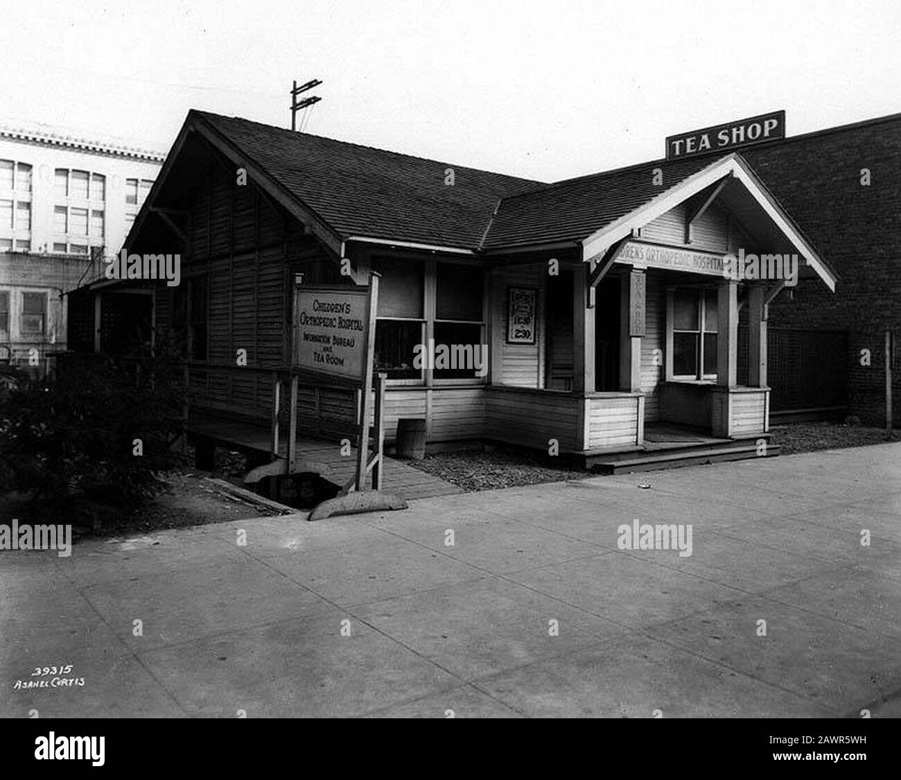 Former residence housing tea room and information bureau of Children's Orthopedic Hospital, 4th Ave between Pine St and Stewart (CURTIS 535). Stock Photo
