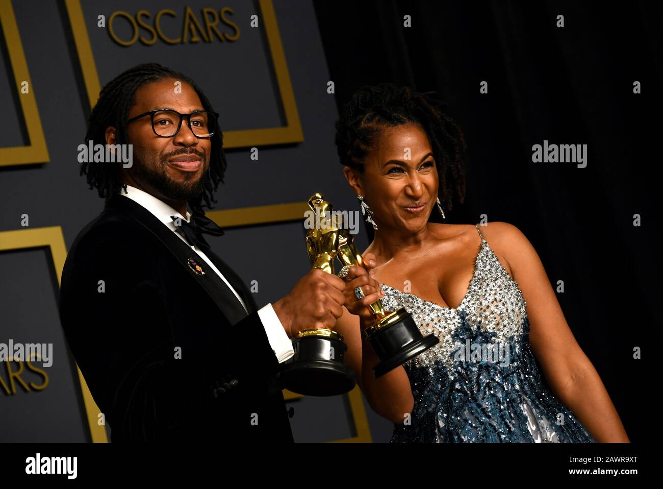 Matthew A. Cherry and Karen Rupert Toliver with their Best Animated Short  Film for Hair Love in the press room at the 92nd Academy Awards held at the  Dolby Theatre in Hollywood,