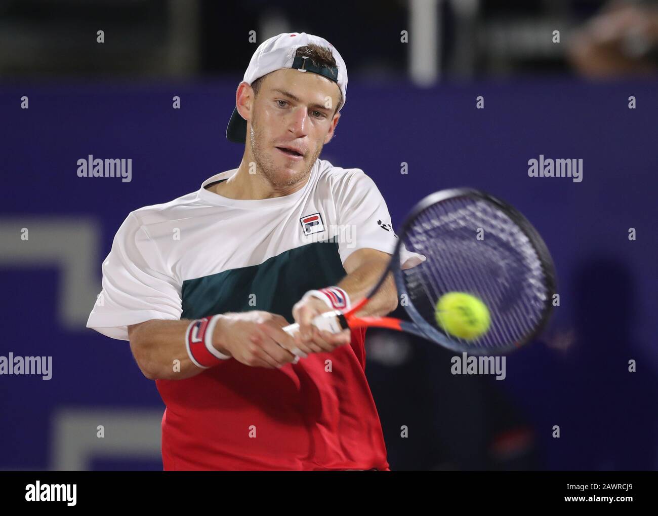 Argentine tennis player Diego Schwartzman returns the ball to Chilean  Cristian Garín during the final of the Cordoba Open, Argentina, 09 February  2020. Garin, number 31 in the world and third head