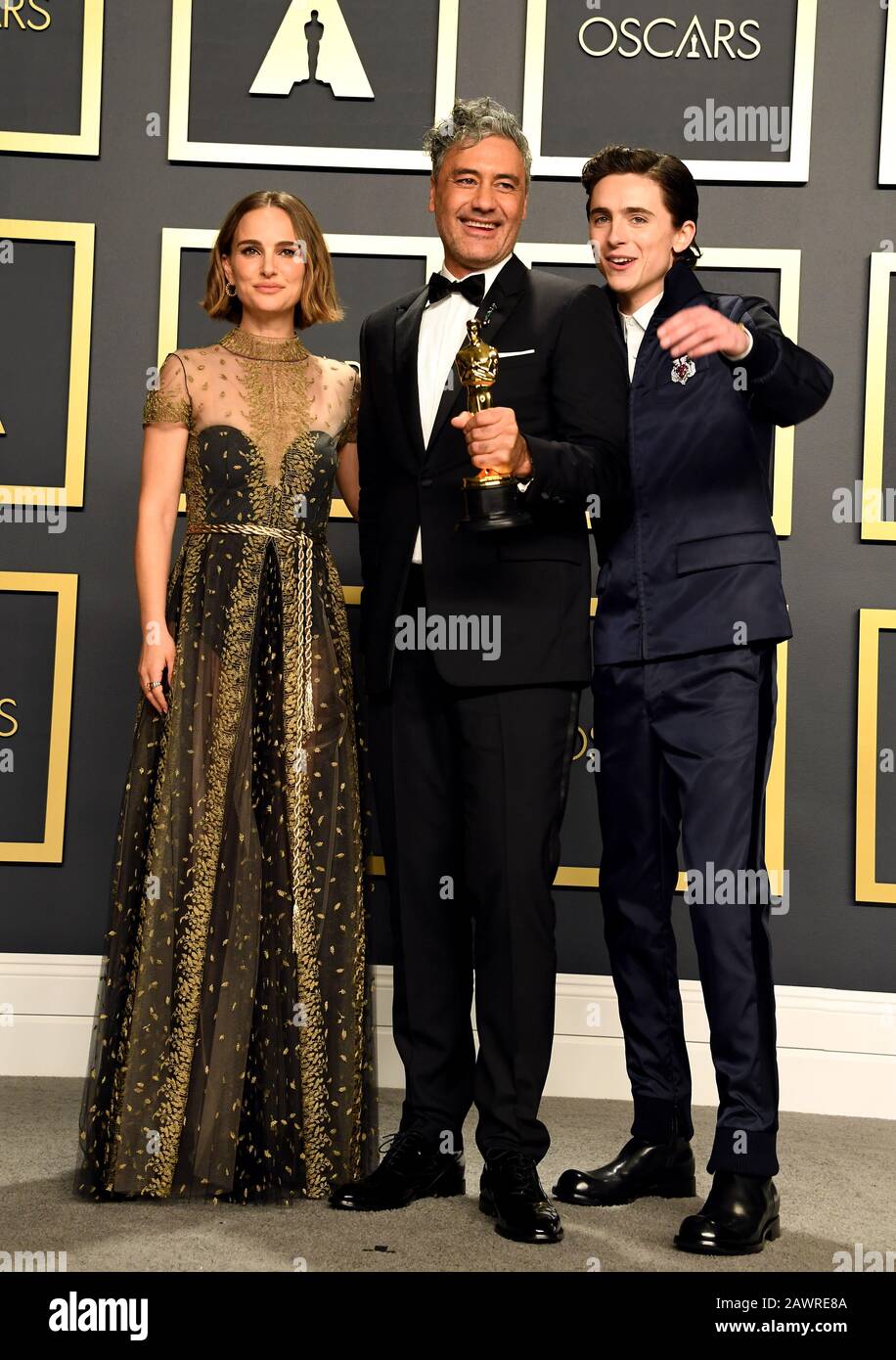 Natalie Portman and Timothee Chalamet present Taika Waititi with his Best Adapted Screenplay for Jojo Rabbit in the press room at the 92nd Academy Awards held at the Dolby Theatre in Hollywood