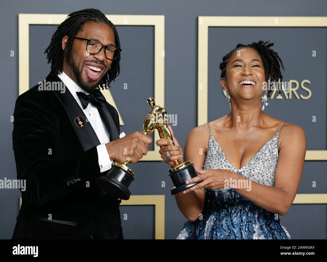 Los Angeles, United States. 09th Feb, 2020. Matthew A. Cherry and Karen  Rupert Toliver, winners of Animated Short Film for 